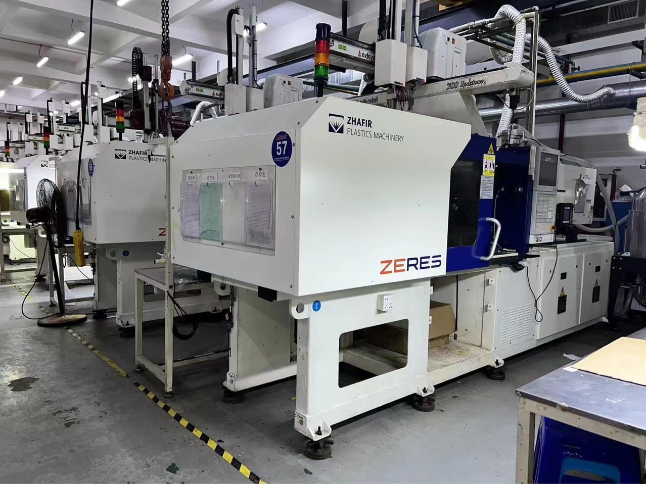 生产中海天长飞亚油电混合电动机zE系列90吨下模410螺杆22射速350