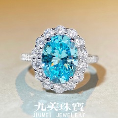 S925純銀ジルコン指輪女性花型満ドリル海藍宝指輪女性ファッション宴会ハト卵指輪卸売り