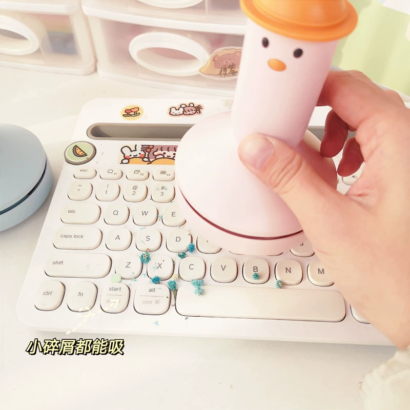 Small vacuum cleaner for elementary school students, handheld keyboard charging, table hygienic pencil