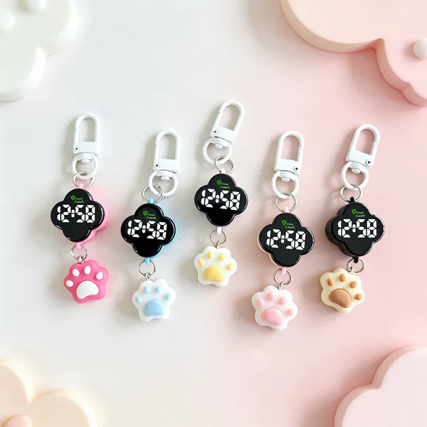 Cartoon four-leaf clover electronic watch keychain pendant, children's portable bag decoration, creative student keychain