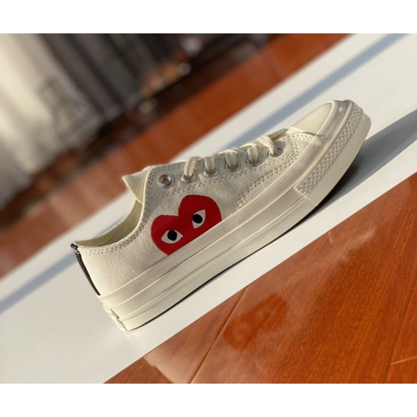 Low top white "One size larger"