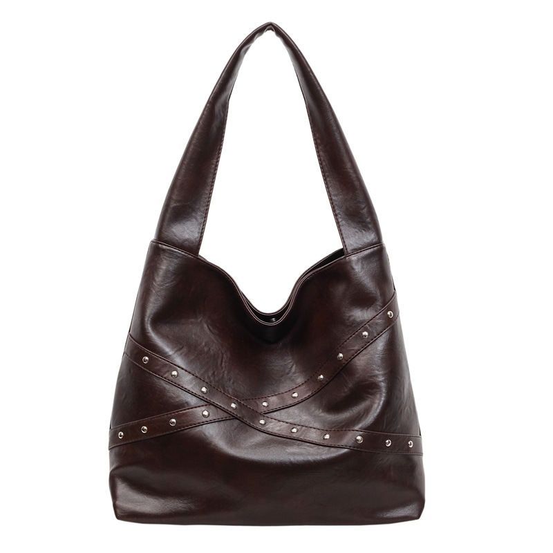 Transfronterizos retro nicho bolsas de cubo portátiles 2025 nuevo transporte de gran capacidad bolsa bolsa de hombro de locomotora