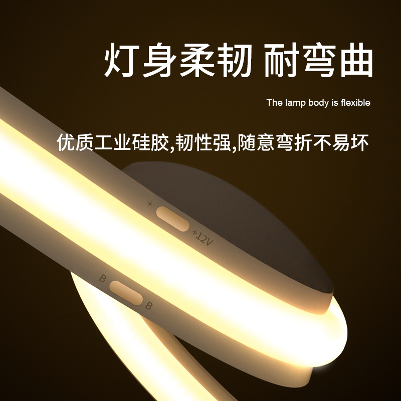 Tira de luz COB autoadhesiva de 12V/24V de bajo voltaje, tira de luz LED flexible y suave para decoración del hogar, techo, gabinete, centro comercial, luz de alta reproducción cromática