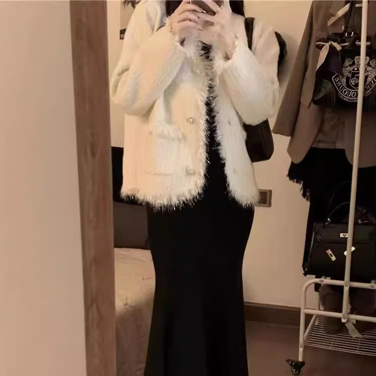 24 invierno Puyuan estilo francés blanco imitación de agua abrigo de invierno de mujeres nuevo estilo de alta calidad