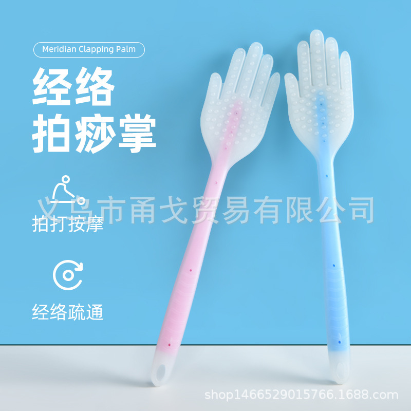 経絡掻き板を長くたたいて、手のひらを養生します。健康的にマッサージします。|undefined