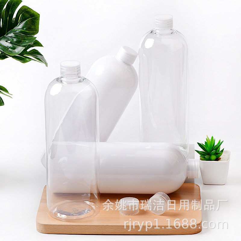1000mlの丸い肩のPETのペットボトルの普通の蓋の純粋な露の瓶の入浴剤のシャンプーの体の乳の洗浄の瓶|undefined
