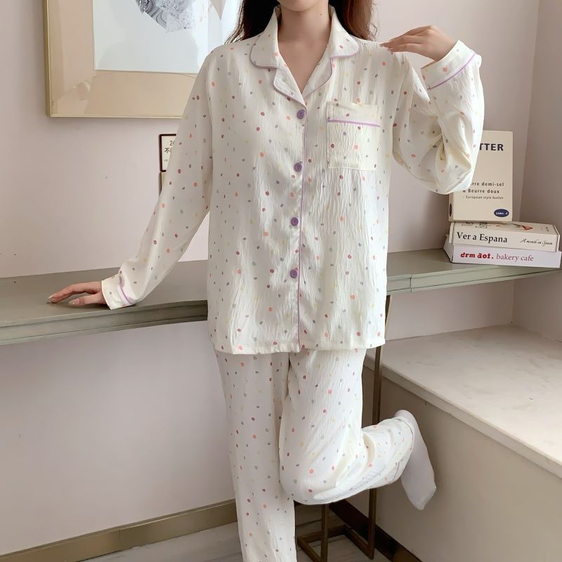 Al por mayor transfronterizo KT gato pijama mujer primavera y otoño nubes algodón manga larga 2026 nuevo juego de ropa de hogar encantadora super caliente