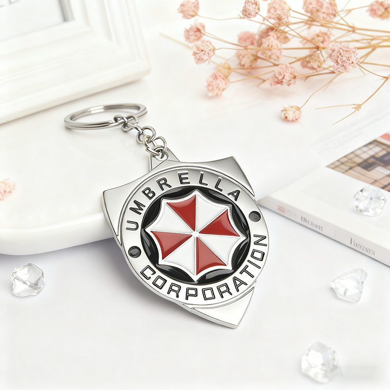 Resident Evil Series Racoon City Umbrella Logo Badge Bag Pendant Alloy Keychain Ring Small Pendant