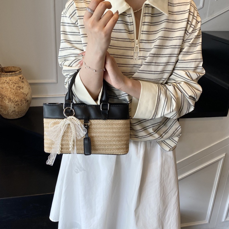 Bolso de vacaciones junto al mar 2025 verano nuevo bolso bolso de hombro de color de contraste tejido de paja bolso de mensajero de playa para mujer