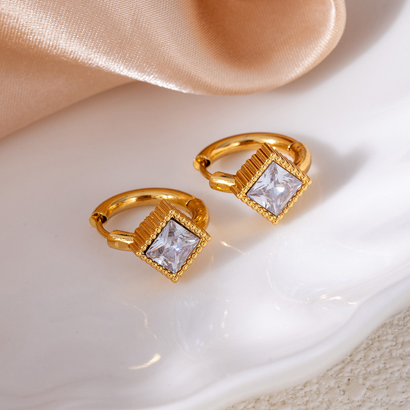 White earrings with zircon