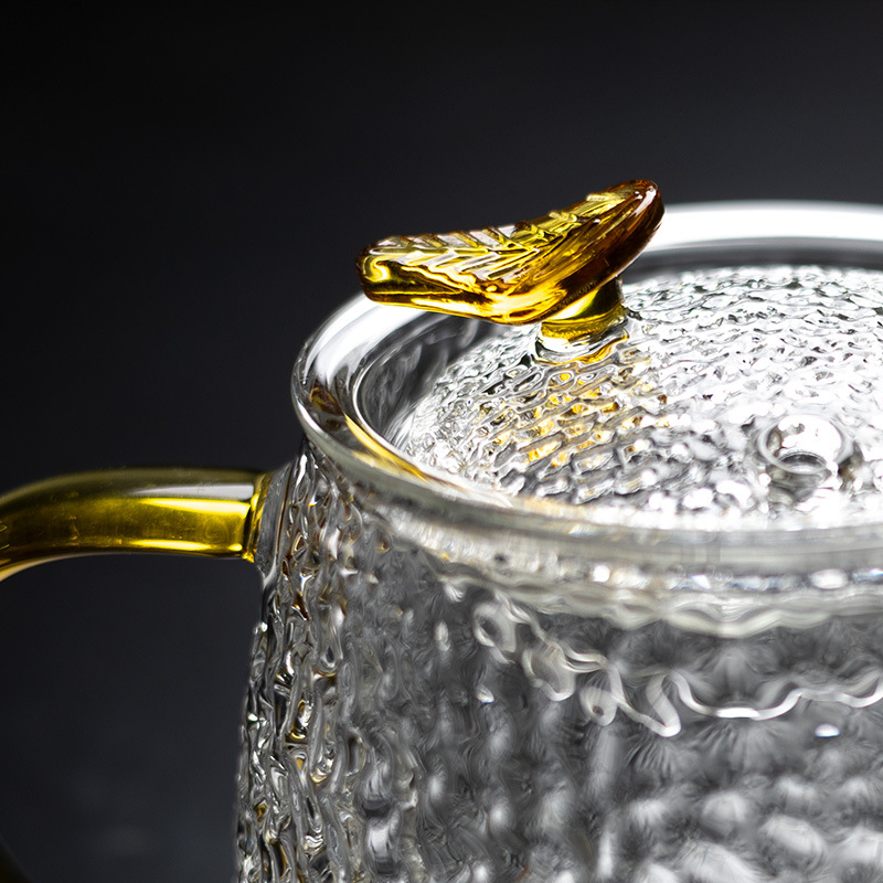 tetera de vidrio martillo conjunto resistente al calor hogar kung fu té taza de té engrosado tetera de té de flores un solo filtro de tetera