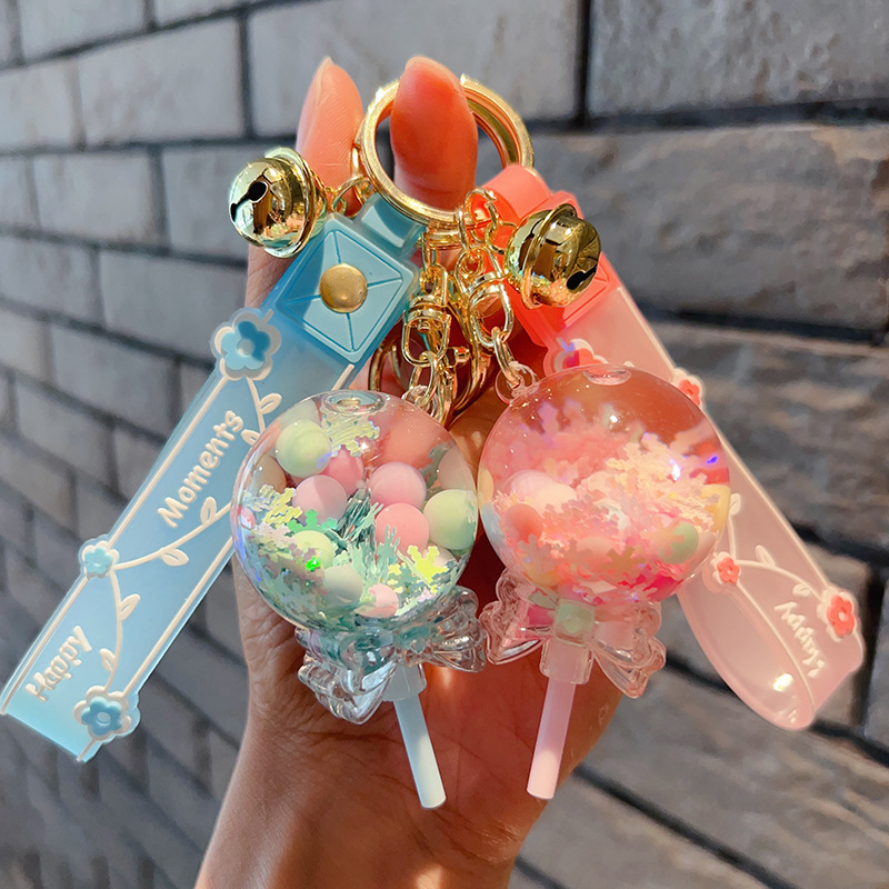 Audio network red small jewelry small pendant cute lollipop bubble beads into the oil quicksand floating bottle keychain wholesale