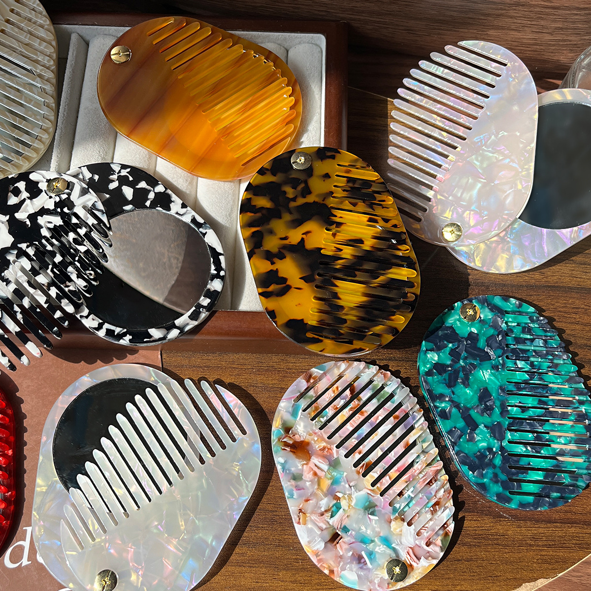 Materiales de placa de fibra de acetato de alta calidad retrógrado belleza espejo de maquillaje peine portátil plegable redondo espejo de maquillaje de acetato