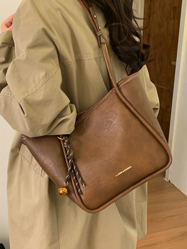 Bolso de mujer venta caliente nuevo nicho coreano bolso de cubo de alta capacidad de sensación universal bolso de moda para niños bolso de hombro