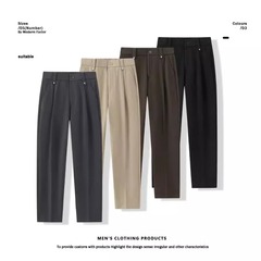 ファッションの半緩みのデザインのズボンの男性の小さいゆったりとした垂れ下がった感じのストレートの筒の垂れ下がった順の抗シワのスーツのズボンはやせているカジュアルなズボンを現します。