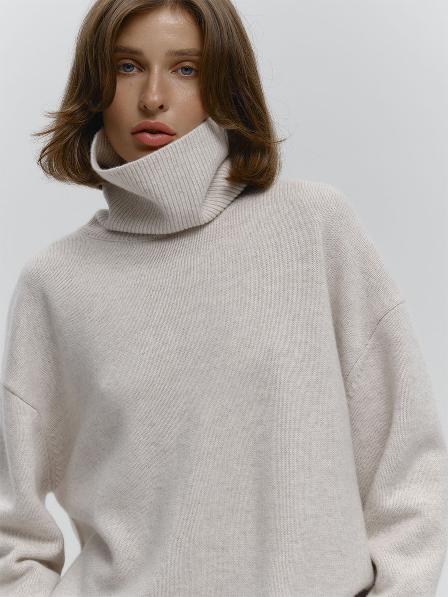 Suéter suelto de cuello alto transfronterizo Europa y los Estados Unidos 2025 otoño y invierno nuevo simple camisa de punto de color sólido abrigo abrigo suéter de cabeza mujer