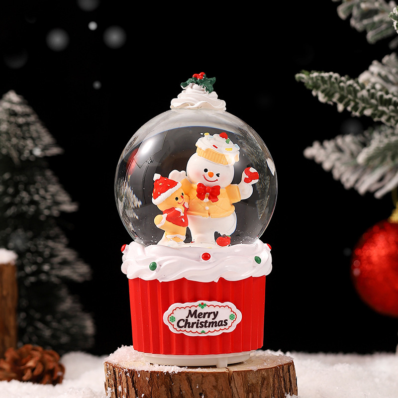 Una variedad de regalos de decoración de Navidad Navidad iluminante bola de cristal caja de música ventana diseño de velas lámparas de viento árbol de Navidad