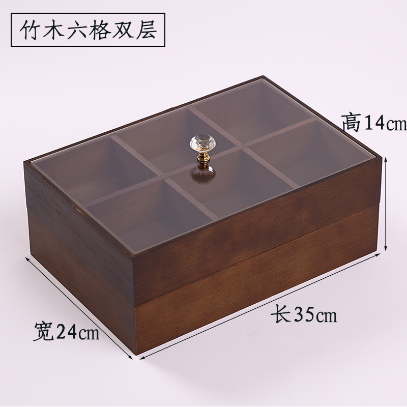 新しい中国式のキャンディーの箱の家庭用の間食の収納箱の客間のお茶のいくつかのお菓子は皿の4格の竹の木の乾燥している果物の箱を並べます。|undefined