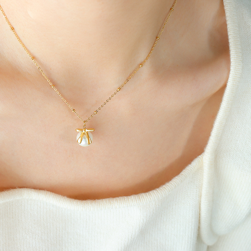 Marka estilo francés ins imitación perla arco pendientes titanio acero 18K oro collar cadena clavícula joyería traje