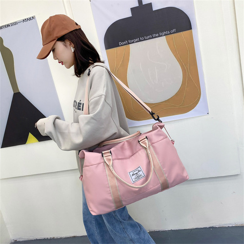 New short-distance business trip travel bag, women's large-capacity shoulder hand-held luggage bag for maternity, can be placed in a trolley suitcase luggage bag