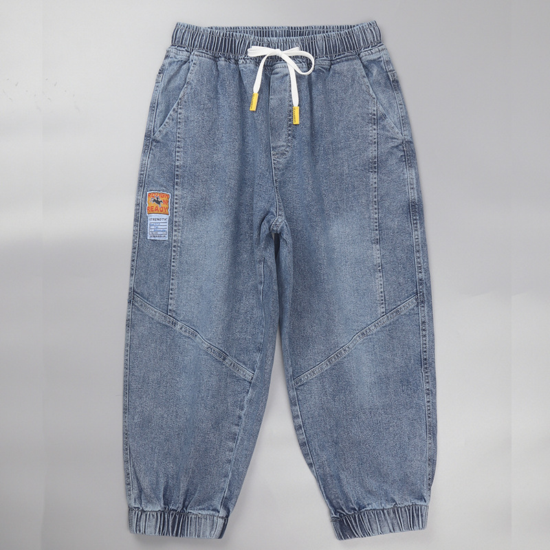 Comercio exterior cortar la etiqueta ropa de hombre suelta pie abrazado siete puntos jeans cintura elástica cuerda de dibujo de verano juvenil ocio pantalones harun moda