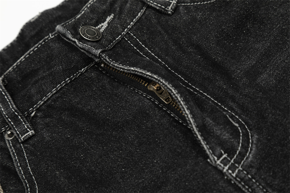 Pantaloncini di jeans camo patchwork da uomo effetto distressed_voghion.com