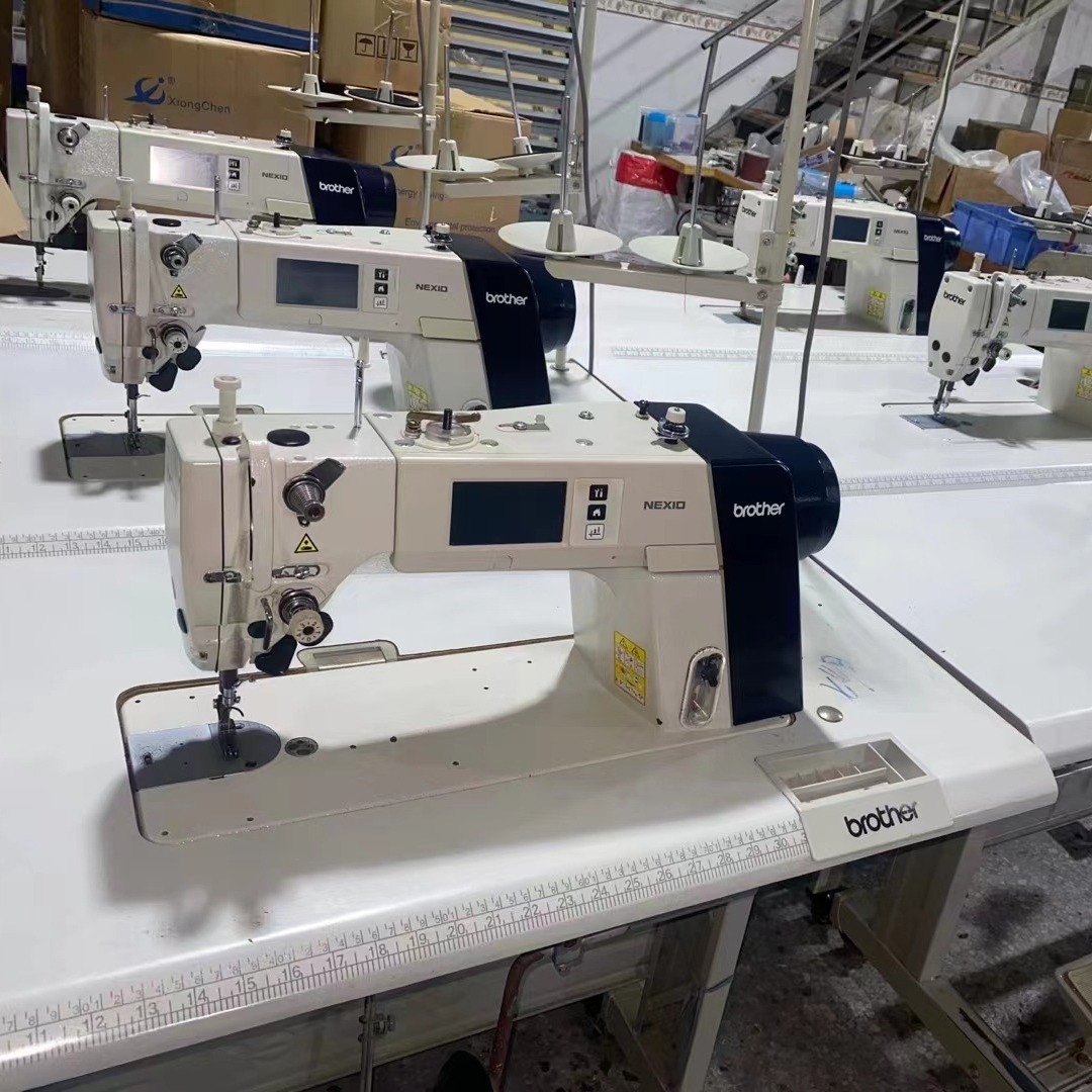 Máquina de coser industrial de cama plana Brother S7300A japonesa, nueva, de marca, al por mayor, de bajo consumo y eficiente.
