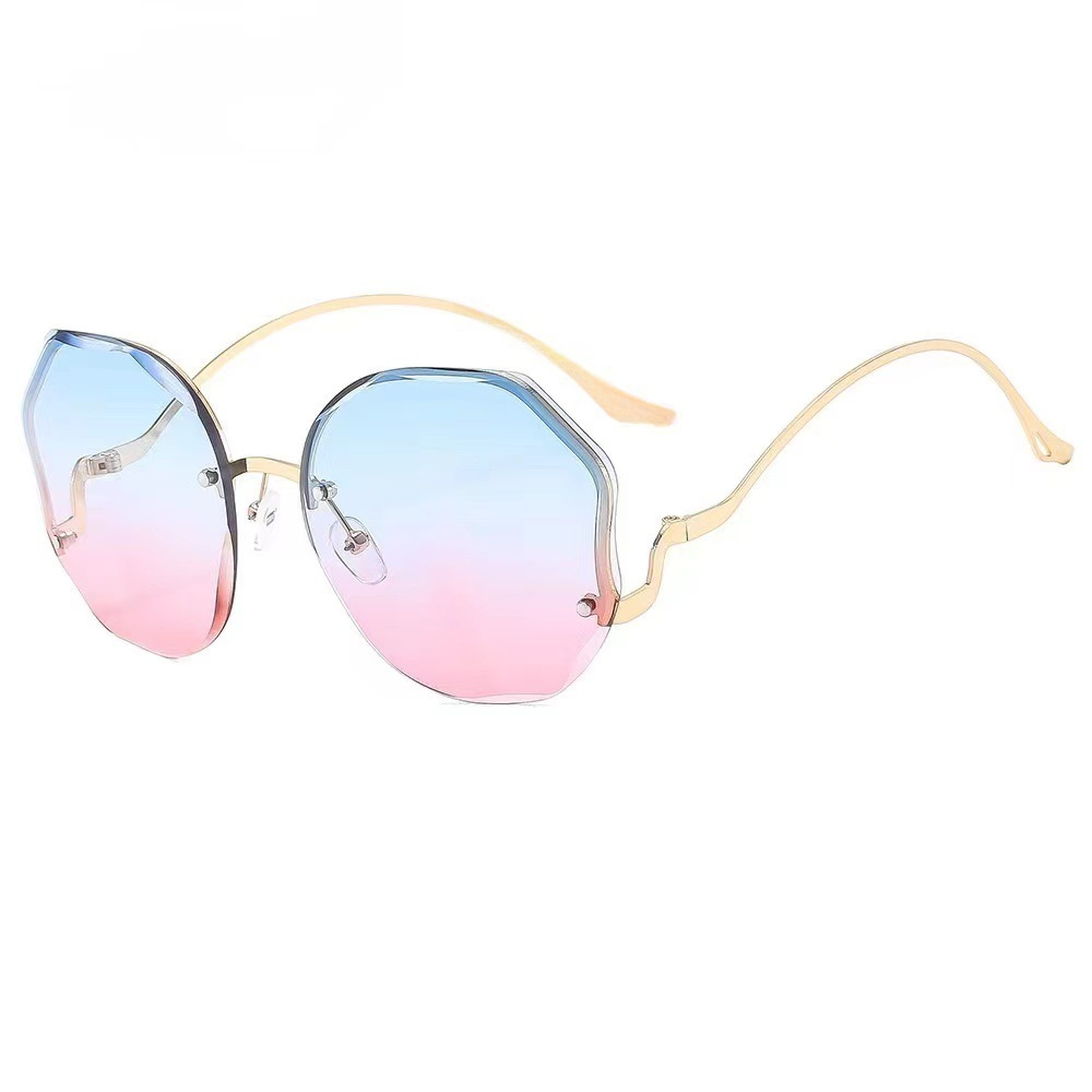 New fashion frameless cut-edge sunglasses women's polygon metal arc glasses leg street shot all-match sun protection sunglasses_voghion.com
