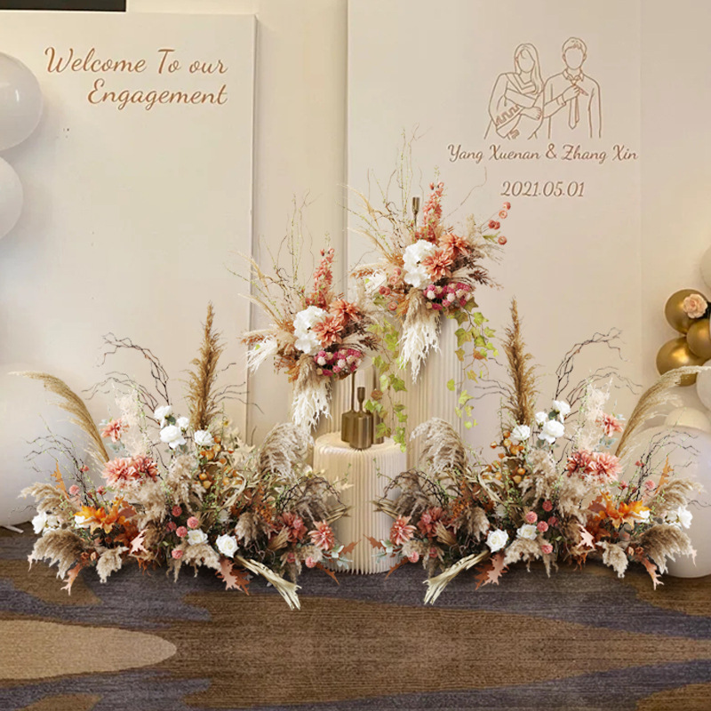 乾燥葦美陳花芸セット結婚式イベント迎賓区に花テーブルの花の道を配置して木の枝をシミュレーションします。|undefined