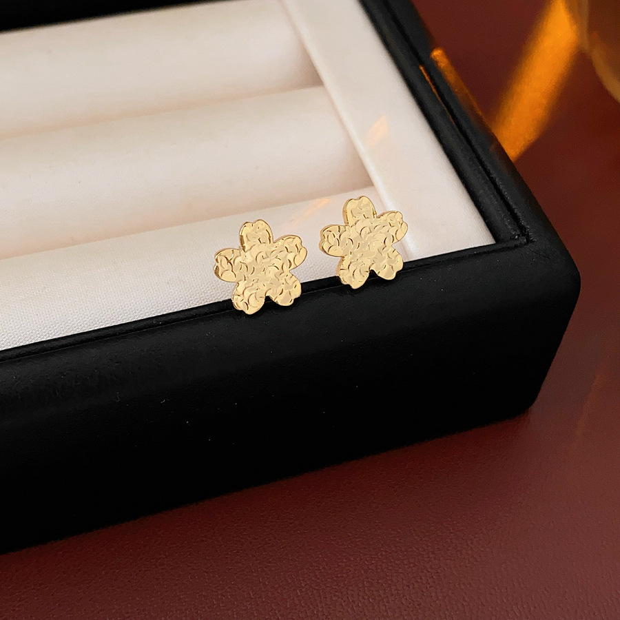 Pendientes de flor de lazo elegante de súper hada de plata Pendientes de moda de lujo ligero francés Pendientes de todo fósforo dulce de estilo literario