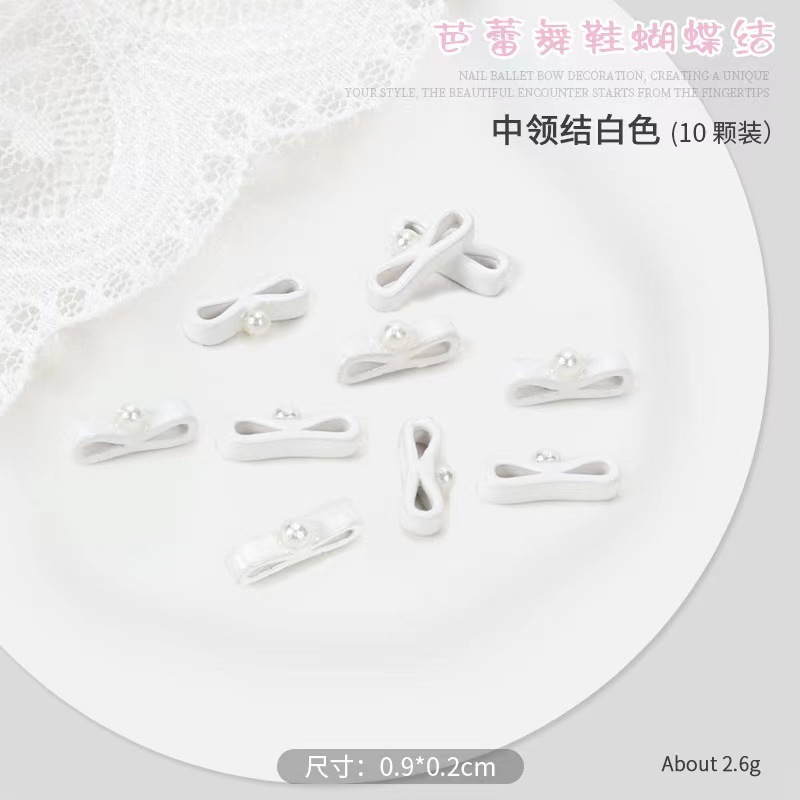 Pequeño libro rojo explosión zapatos de ballet arco flotante joyería de manicura corbata tridimensional 10 paquetes de aleación