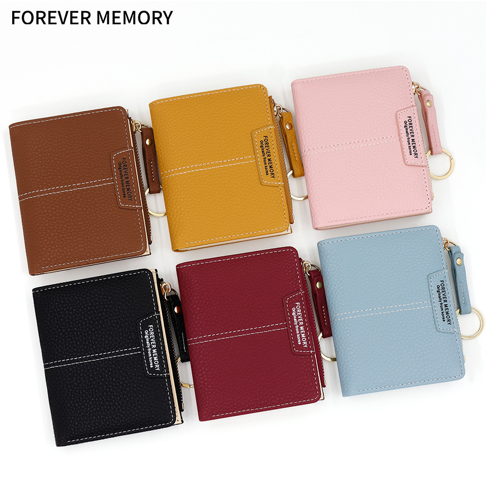 Versión coreana de la nueva billetera corta para mujer, llavero simple, billetera de monedas, billetera de dos pliegues para estudiantes al por mayor