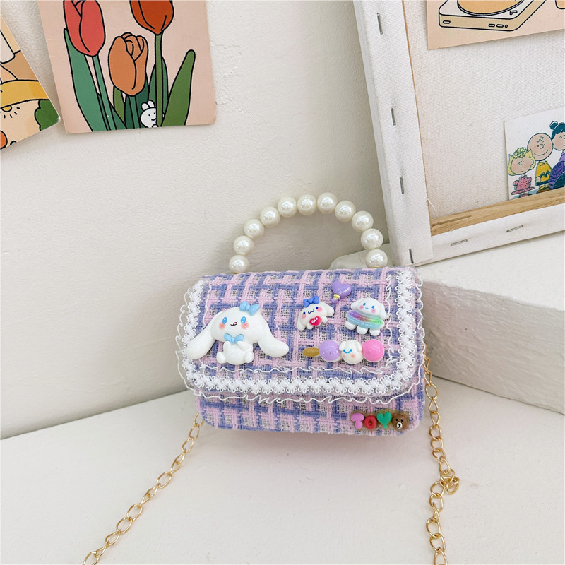 Otoño e Invierno nueva niña monedero dibujos animados lindo accesorios perla bolso versátil estilo occidental bebé bolsa de hombro