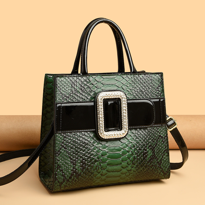 Nueva moda europea y americana todo-fósforo Luz de lujo en relieve patrón de piel de serpiente portátil hombro crossbody bolso de las mujeres