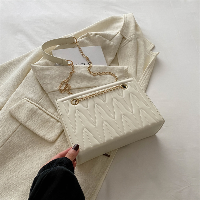 Bolsa de cadena de textura de alta calidad para mujer 2024 nueva moda rombo viajero de un solo hombro mensajero de nicho bolso cuadrado pequeño Tote