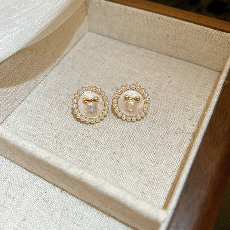 Aguja de plata-oro-blanco