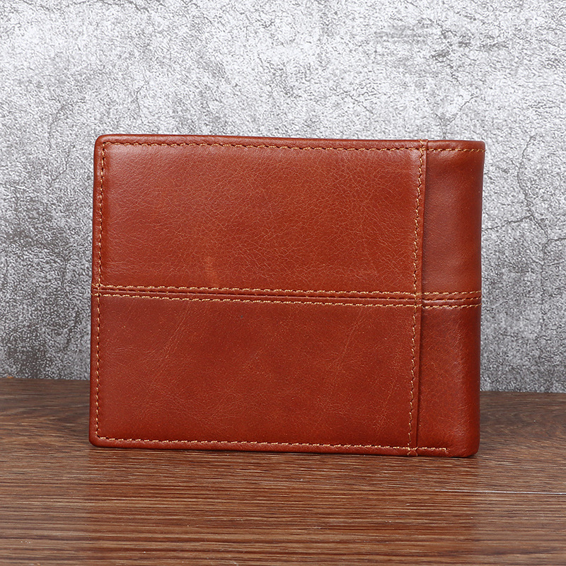 Hombres cartera horizontal de cuero genuino cartera retro moda casual primera capa de costura de piel de vaca corto tríptico cartera al por mayor