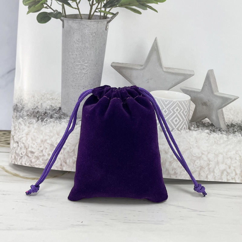 Bolsa de franela de joyería al por mayor venta directa de fábrica de cosméticos auriculares banco de energía a prueba de polvo almacenamiento bolsillo de cordón de joyería