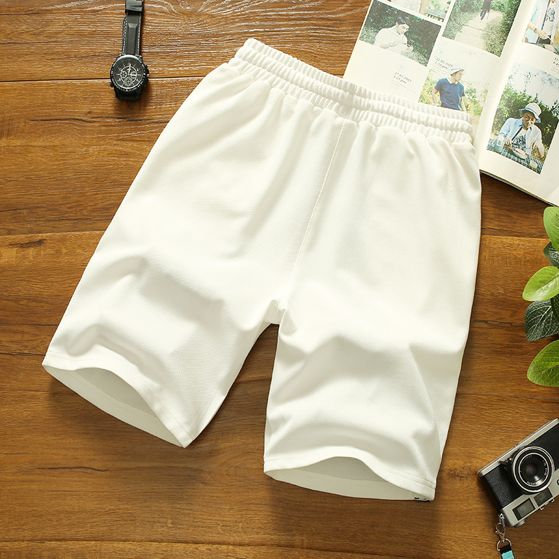 Nuevos pantalones cortos para hombres coreanos tendencia delgados pantalones de hombre 5 puntos pantalones casuales deportivos