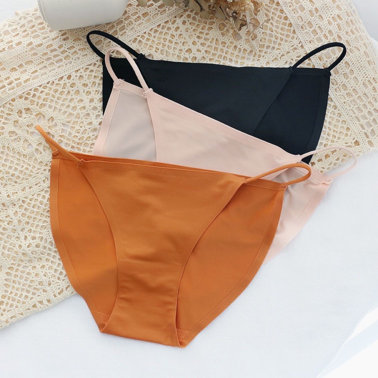 Pantalones íntimas de seda de hielo sin marcas, cintura baja, pantalones de una sola pieza, bikini, thongs.