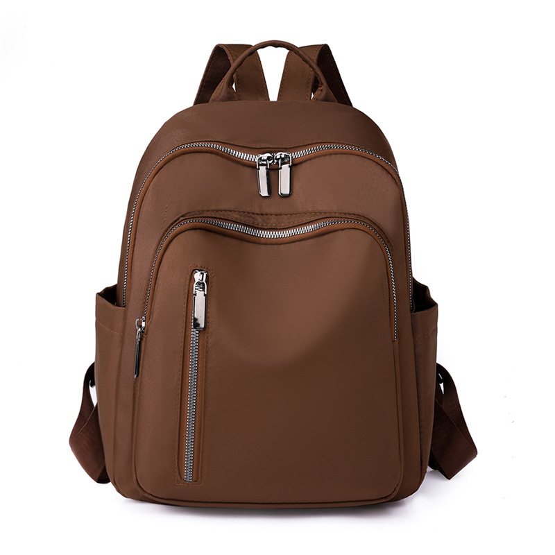 2023 nueva mochila de nailon para mujer coreana, mochila de viaje de gran capacidad para viajeros urbanos de todo fósforo de moda al por mayor