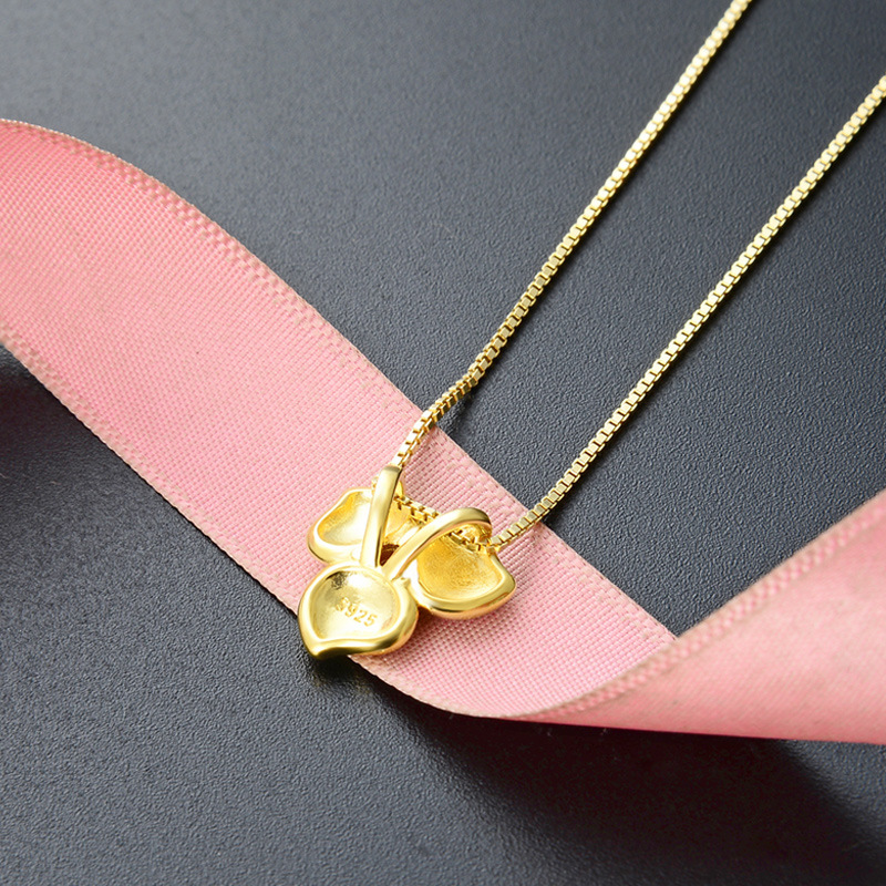 Japón y Corea del Sur lujoso ligero collar de pétalos de tres hojas mujer 925 plata esterlina moda versátil cadenas clavículas ins colgante de flores goteando aceite