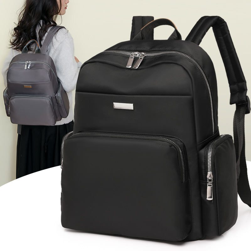 Mochila de nailon para mujer 2024 nueva moda anti-salpicaduras mochila para mujer mochila de viaje ligera de gran capacidad al por mayor