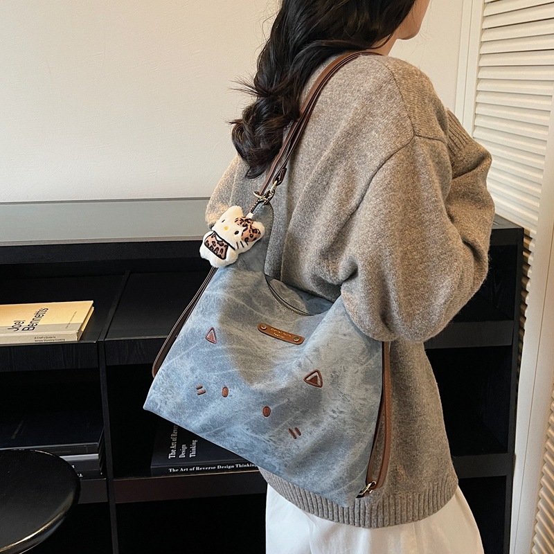 Coreano lindo gato de dibujos animados mochila de hombro de mujer mochila casual de gran capacidad de tres usos de la moda de la mochila de viaje