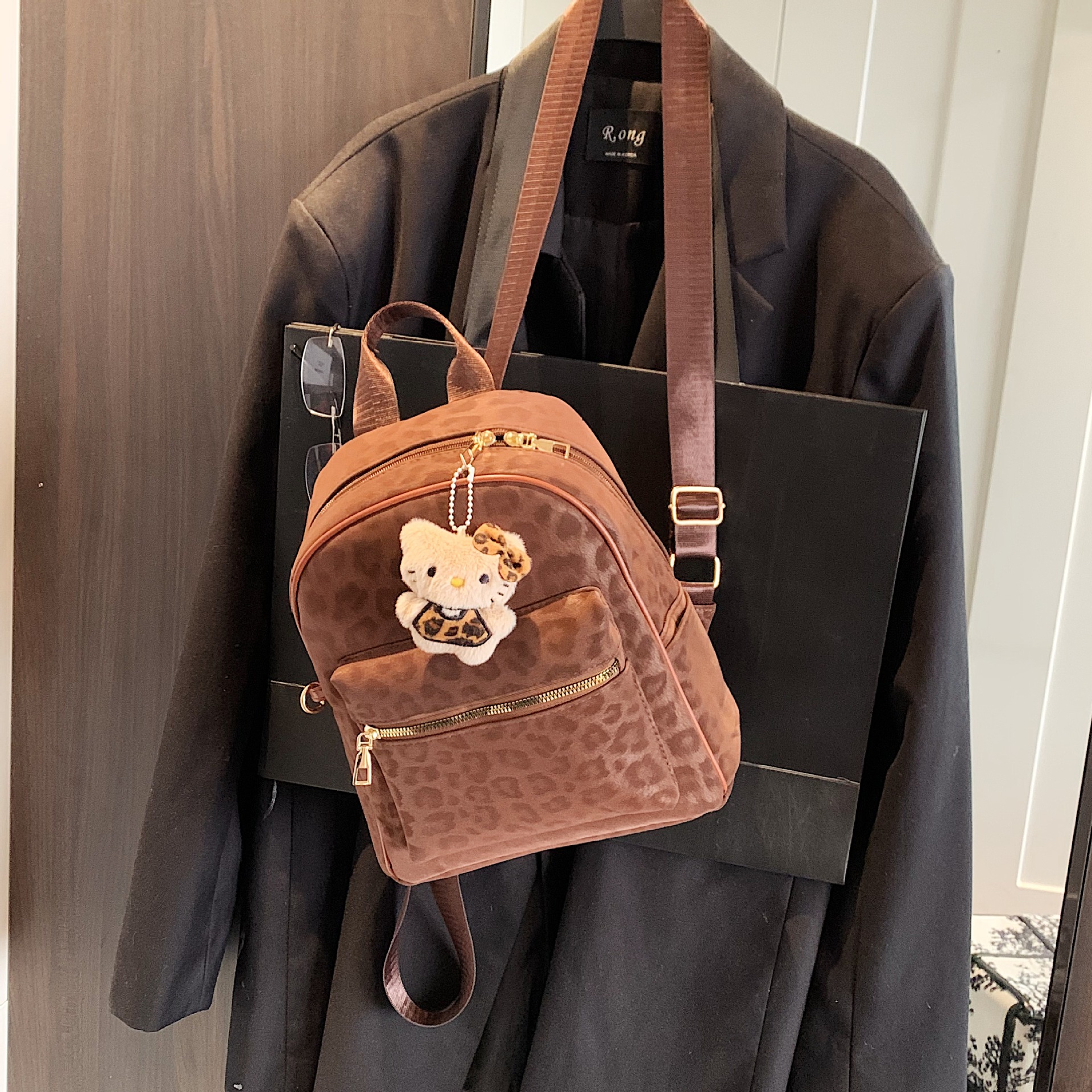 Retro lujo ligero leopardo mochila de nicho ligero de gran capacidad mochila de viaje de mujer bolsa de viaje
