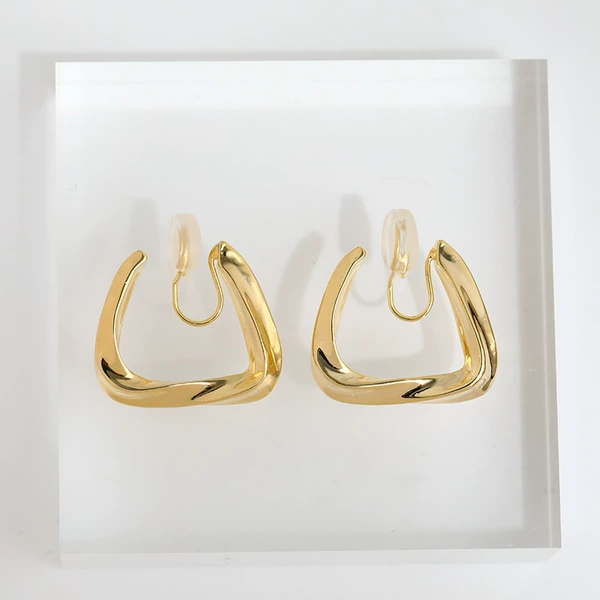 Golden mosquito coil, ear clips, no pierced ears
