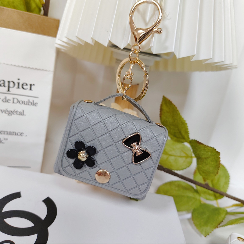 Nuevo estilo transfronterizo, moderno y exclusivo mini bolso acolchado tipo colgante, monedero para llaves, accesorio para auriculares.