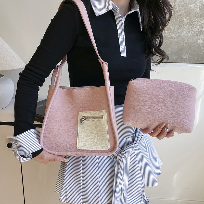 Bolso de axila popular de este año 2025 verano nuevo bolso femenino moda patrón de lichi bolso de hombro de color de contraste