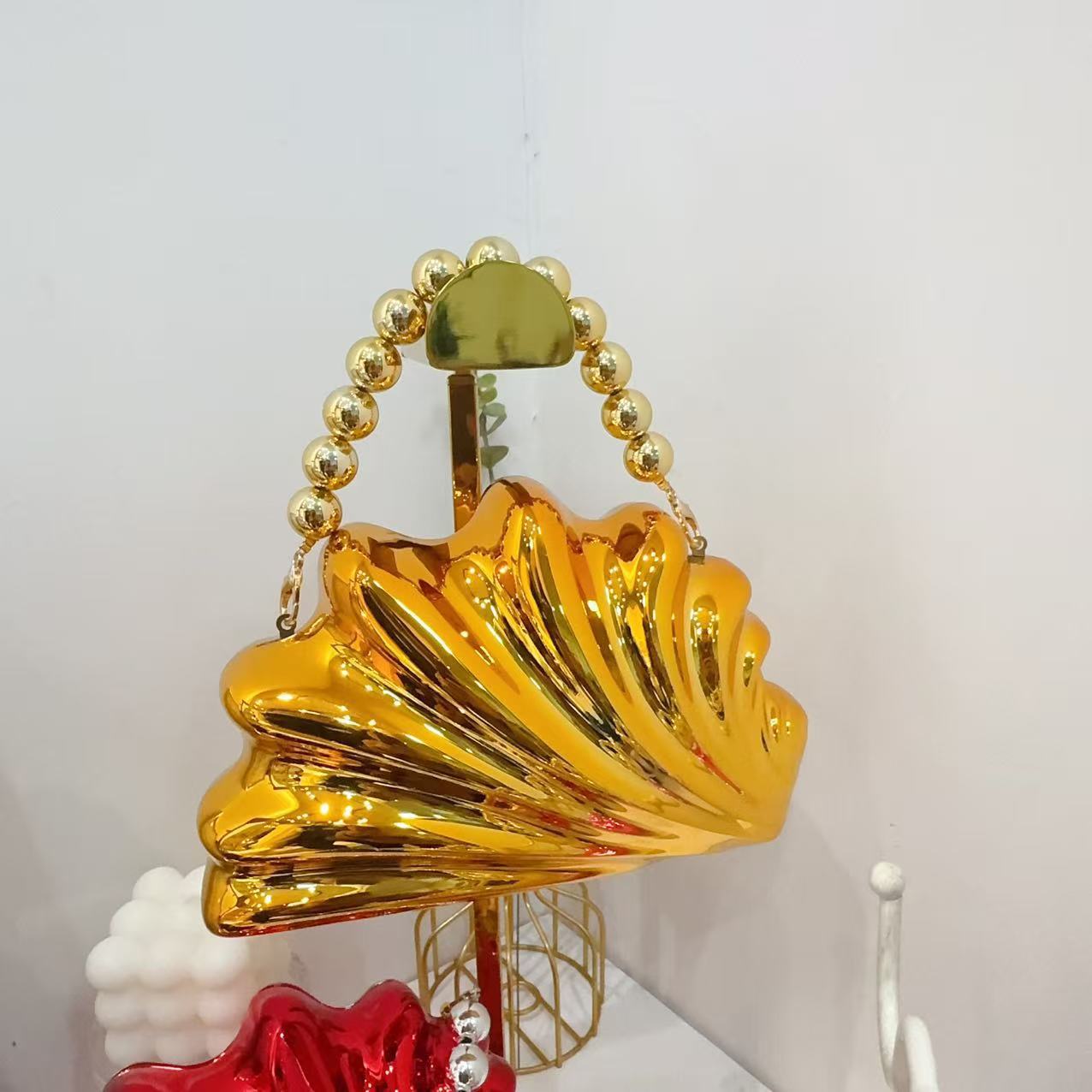 Bolsa de cena de lujo ligera transfronteriza estilo de conchas personales bolsas acrílicas perlas portátiles brillante cara de moda damas bolsas de noche