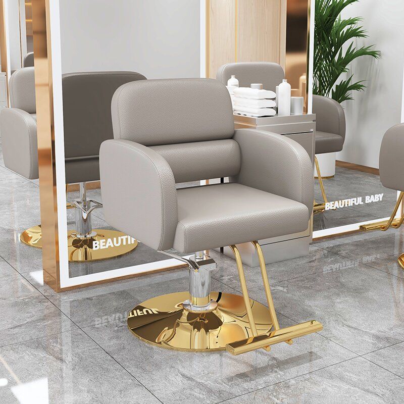 La nueva silla de peluquería simple e innovadora, la silla de peluquería teñida en permanente se puede levantar y levantar, la silla de peluquería giratoria, la silla de corte para el cabello